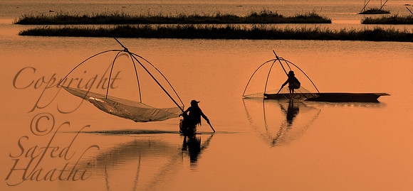 Fishermen on Loktak Lake at Dawn