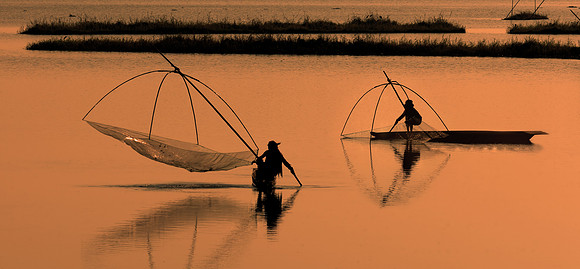 Fishermen on Loktak Lake at Dawn